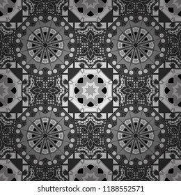 Vector illustration. Seamless pattern with decorative geometric and abstract elements in gray, black and white colors.