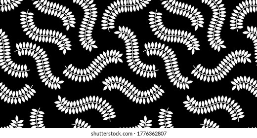 Vector illustration, seamless pattern, decorative wavy branches with white leaves on a black background. Botanical drawing for wallpaper, textile and fabric design.