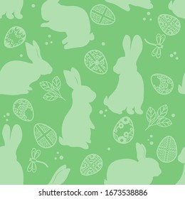Vector illustration. Seamless pattern. Easter eggs. Leaves and willow branch. Easter bunny. Card green background.