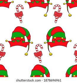 Vector illustration. Seamless pattern elf hat and Christmas cane on a white background. Design element for poster, banner, clothes.