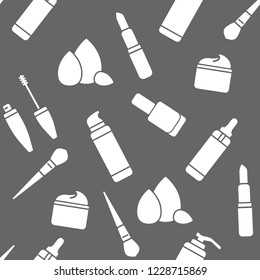 Vector illustration seamless pattern. Flat icons. Makeup and beauty set. Brush, foundation, lotion, lipstick, mascara, nail polish, cream, sponge. White silhouette