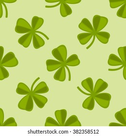 Vector illustration of the seamless pattern with four-leaf clover for Saint Patrick's Day. Background perfect for textiles, interior design, for book design, website background. 