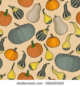 Vector illustration. Seamless pattern. Hand drawing pumpkin on a light background. Bright autumn wallpaper.