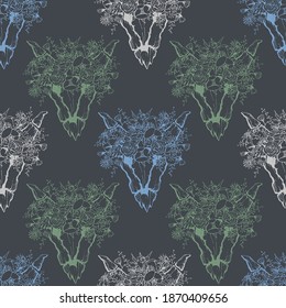 Vector illustration of seamless pattern with horn masks with flowers.