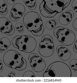 Vector illustration. Seamless pattern of large and small human skulls, hand drawn. Repetitive wallpaper of bones. Creepy evil Halloween background. The day of the Dead. Design of wrapping, gift paper.