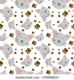 Vector illustration. Seamless pattern on the topic of pets. Muzzle of a kitten with footprints. .Seamless design