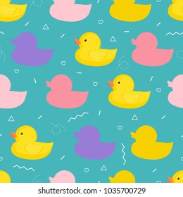 Vector illustration. Seamless vector pattern with a rubber duck on a blue background. Colored ducks.