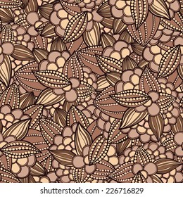 Vector illustration. seamless pattern of stylized leaves and fruits of cocoa beans.
