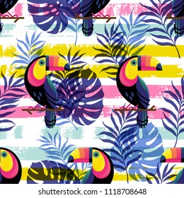 Vector illustration, seamless pattern with tropical leaves and a Toucan on a hand drawn paint background