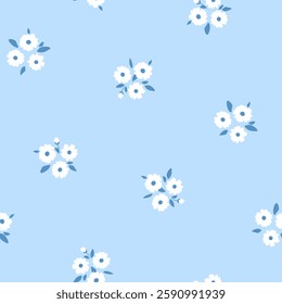 Vector illustration. Seamless pattern of white small flowers on a blue background. Ditsy floral blue pattern, field of flowers, print for fabric, textile, wallpaper, baby clothes, packaging