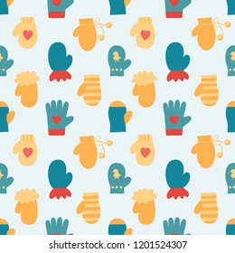Vector illustration: seamless pattern with winter clothes: blue and yellow gloves and woolen mittens with different ornaments. Decor for Christmas fabric, scrapbook, wrapping paper on blue background