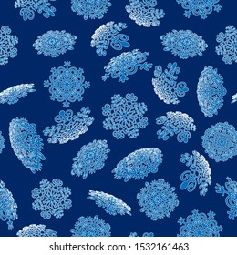 Vector illustration of a seamless pattern of winter and New Year theme. Various snowflakes are depicted on a light background. Can be used as gift paper and for various decor.