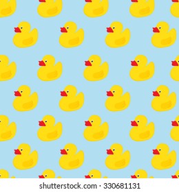 Vector illustration seamless pattern yellow rubber duck baby toy on blue background. For cards, invitations or baby shower albums.