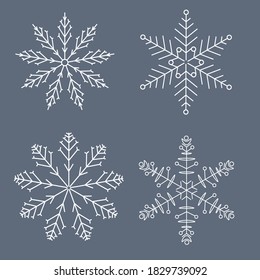 Vector illustration of Set 9 different snowflakes of handwork for design. Winter objects. Festive elements. Doodle sketch
