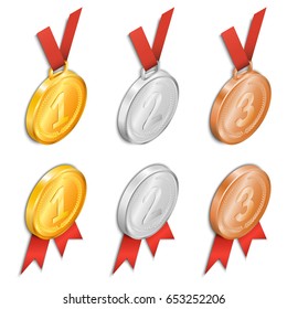 Vector illustration. A set of award medals with ribbons - gold, silver or bronze. Isometric, 3D.
