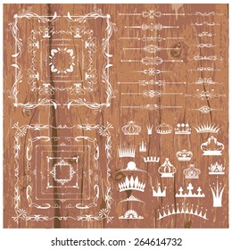 Vector illustration of a set of calligraphic dividers and floral page elements, corners and frames for scrapbook and other designs on wood background
