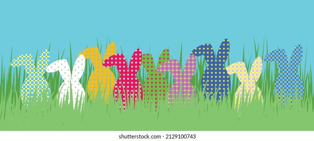 Vector illustration with set of colorful easter bunnies in grass