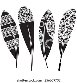 Vector illustration of a set of feathers in black and wight graphic style