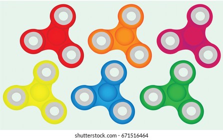 A vector illustration of a set of fidget spinners at an angle with the following colors: red, orange, purple, yellow, blue and green.