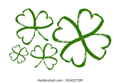 Vector illustration: Set of Hand drawn brush shamrocks on white background. Sketch line clover.