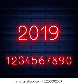 Vector illustration set of red glowing neon numbers on dark brick wall background in realistic style. Template for congratulation banner with shining numerals collection and 2019 sign.