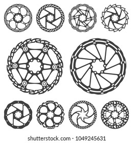 Vector illustration set of silhouettes of a bicycle brake disc, isolated on a colored background.