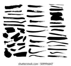 Vector illustration. Set of vector strokes. Grungy texture. The black brush strokes on white background. Collection of brushes and stains. The elements for graphic design.