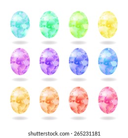 Vector illustration: set of twelve  abstract shiny rainbow eggs made of confetti 