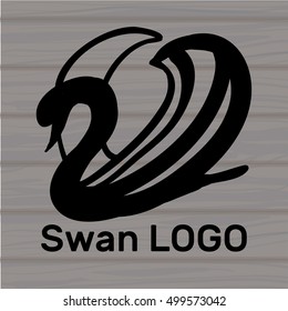 Vector illustration of Set white and Black Swans Logo on wood background. Design template.