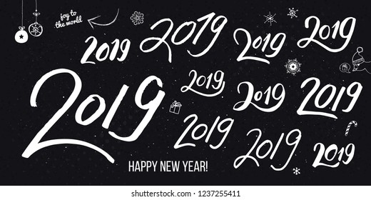 Vector illustration. Set of white typographic hand drawn vintage 2019 numbers for Your poster or card design. With joy to the world and Happy new year text and various winter holidays symbols.