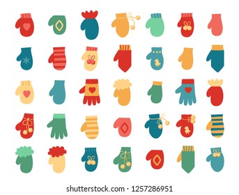 Vector illustration: set of winter hand clothes: bright gloves and  mittens  isolated on white background. Decorative elements for Christmas greeting cards, fabrics, wallpapers, wrapping paper
