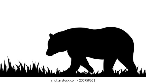 Vector illustration the silhouette of bear in the grass.