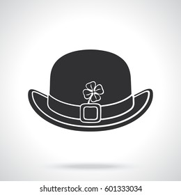 Vector illustration. Silhouette of front view of bowler hat with buckle and clover. Saint Patrick's Day symbol. Patterns elements for greeting cards, wallpapers