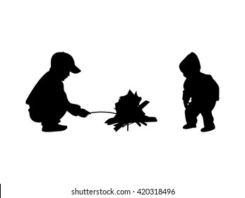 Vector illustration silhouette of kids sitting around the campfire. Isolated on white background. Two children at the bonfire.