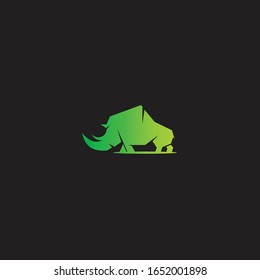 Vector illustration of a silhouette of a rhino standing on isolated white background. Rhinoceros side view profile.