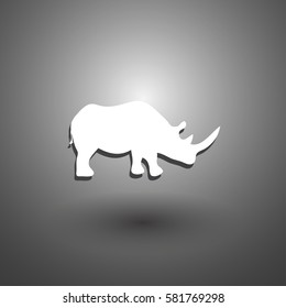 Vector illustration of a silhouette of a rhino standing