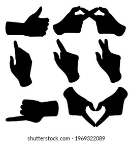 Vector illustration of silhouettes of hands with fingers. An isolated image of different gestures.