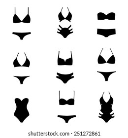 Vector illustration of silhouettes of modern swimsuits on white background. Bikini set
