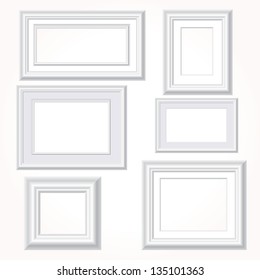 vector illustration of six empty white frames on white wall