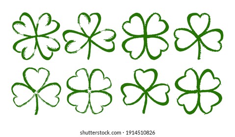 Vector illustration: Sketch line clover. Set of Hand drawn brush shamrocks on white background. 