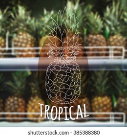 Vector illustration. Sketch of pineapple on a background of blurred pictures of pineapples on a shelf in a store