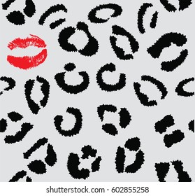 vector illustration of a snow leopard skin with red lipstick kiss.
