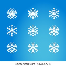 Vector illustration, snowflake icon set. Isolated white silhouette on a blue background with gradient. Applicable as a decorative element for Xmas designs, winter weather concepts etc.