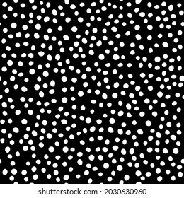 Vector illustration. Spotted black and white seamless pattern. Geometric abstract pattern with circles by hand.