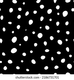 Vector illustration. Spotted grey, black and white background. Geometric abstract pattern with hand drawn circles. Randomly scattered dots of irregular shape.