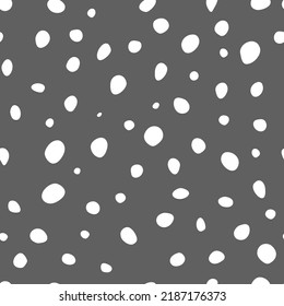 Vector illustration. Spotted grey, black and white background. Geometric abstract pattern with hand drawn circles. Randomly scattered dots of irregular shape.
