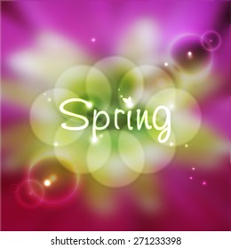 Vector illustration. Spring blurred background with the text "Spring".