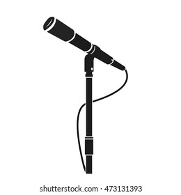 A vector illustration of a stage Microphone silhouette icon.