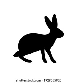 Vector illustration of a standing rabbit. Black silhouette of a hare on a white background. Doodle Style.
