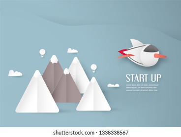 Vector illustration with start up concept in paper cut, craft and origami style. Rocket is flying on blue sky. Template design for web banner, poster, cover, advertisement. It's art craft for kids .